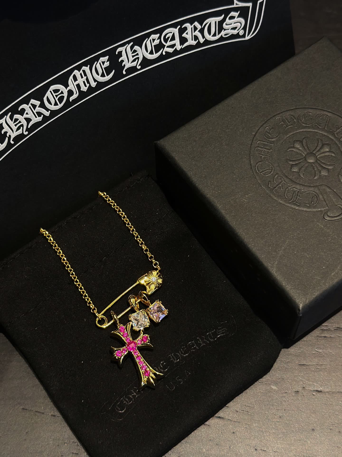 Chrome Hearts Gold Cross Pendant with Gemstones